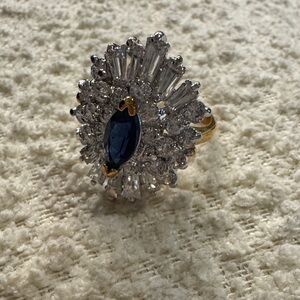 Elegant Gold and Silver tone Ring with Blue Gemstone